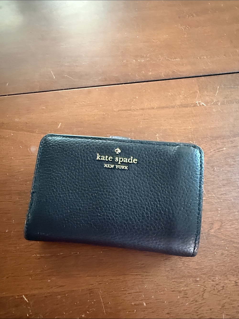 kate spade Black Pebbled Leather Zip Wallet with Gold Logo